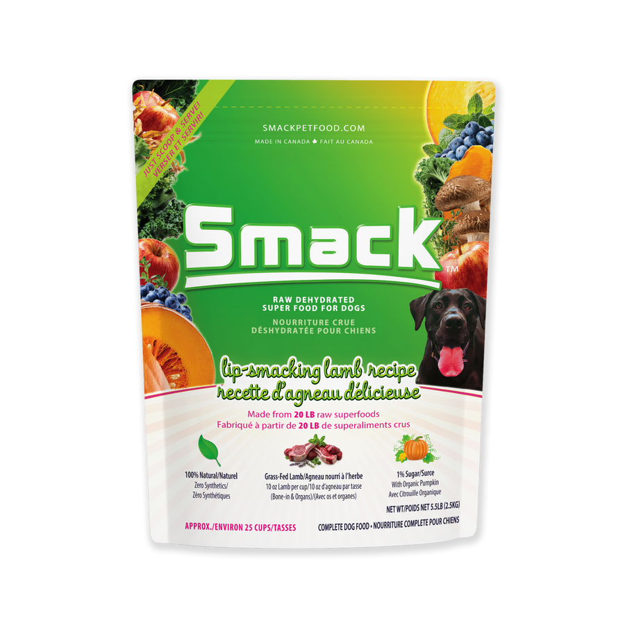 Smack dog food package with green label and images of fruits and vegetables on a white background